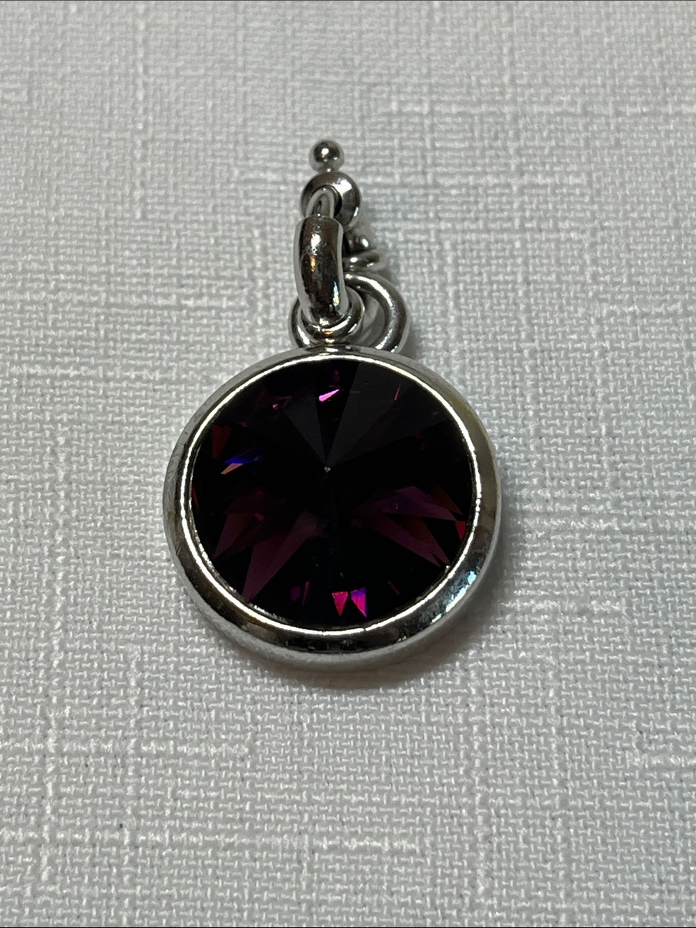 Myka Round Purple Crystal Silver Pendant Charm
Bold mystic
